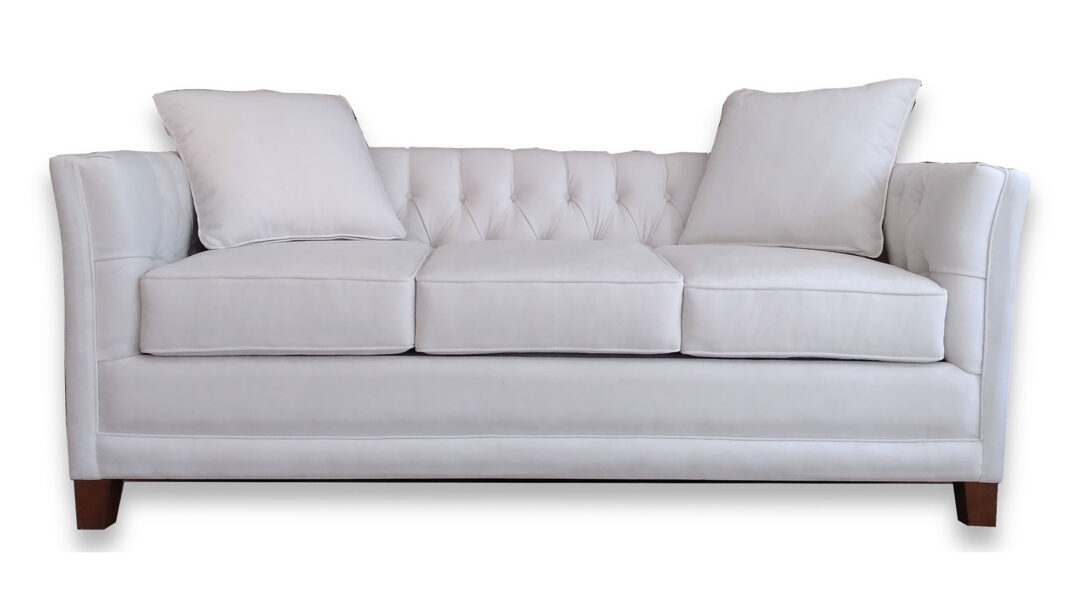 sofá clásico con capitoné